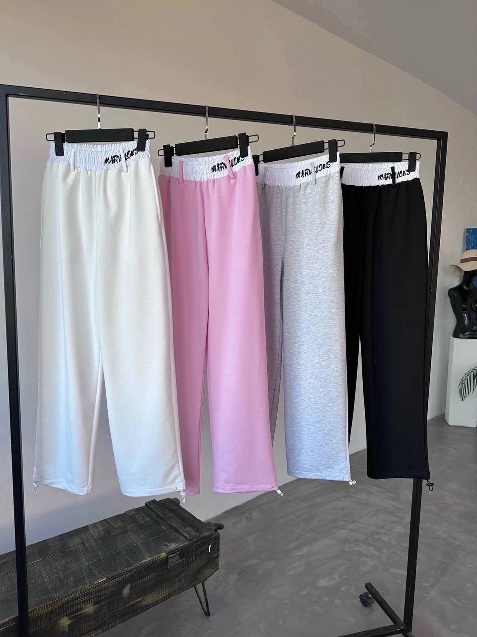 трикотажные брюки,спортивные трикотажные брюки,брюки в спортивном стиле,брюки спортивные,одежда брюки