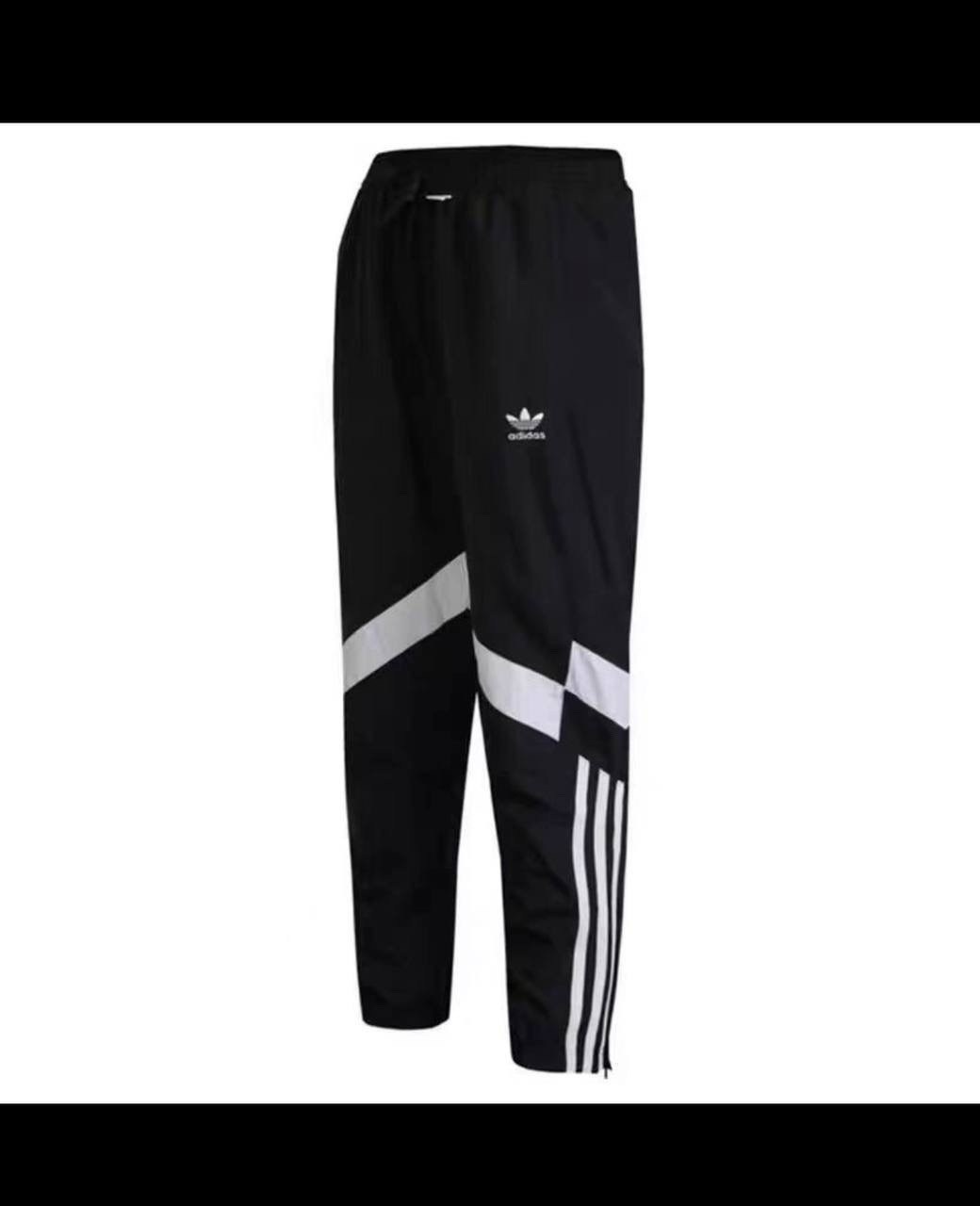 мужские повседневные брюки nike,спортивные брюки nike,мужские брюки nike,спортивные штаны nike,nike штаны swoosh woven