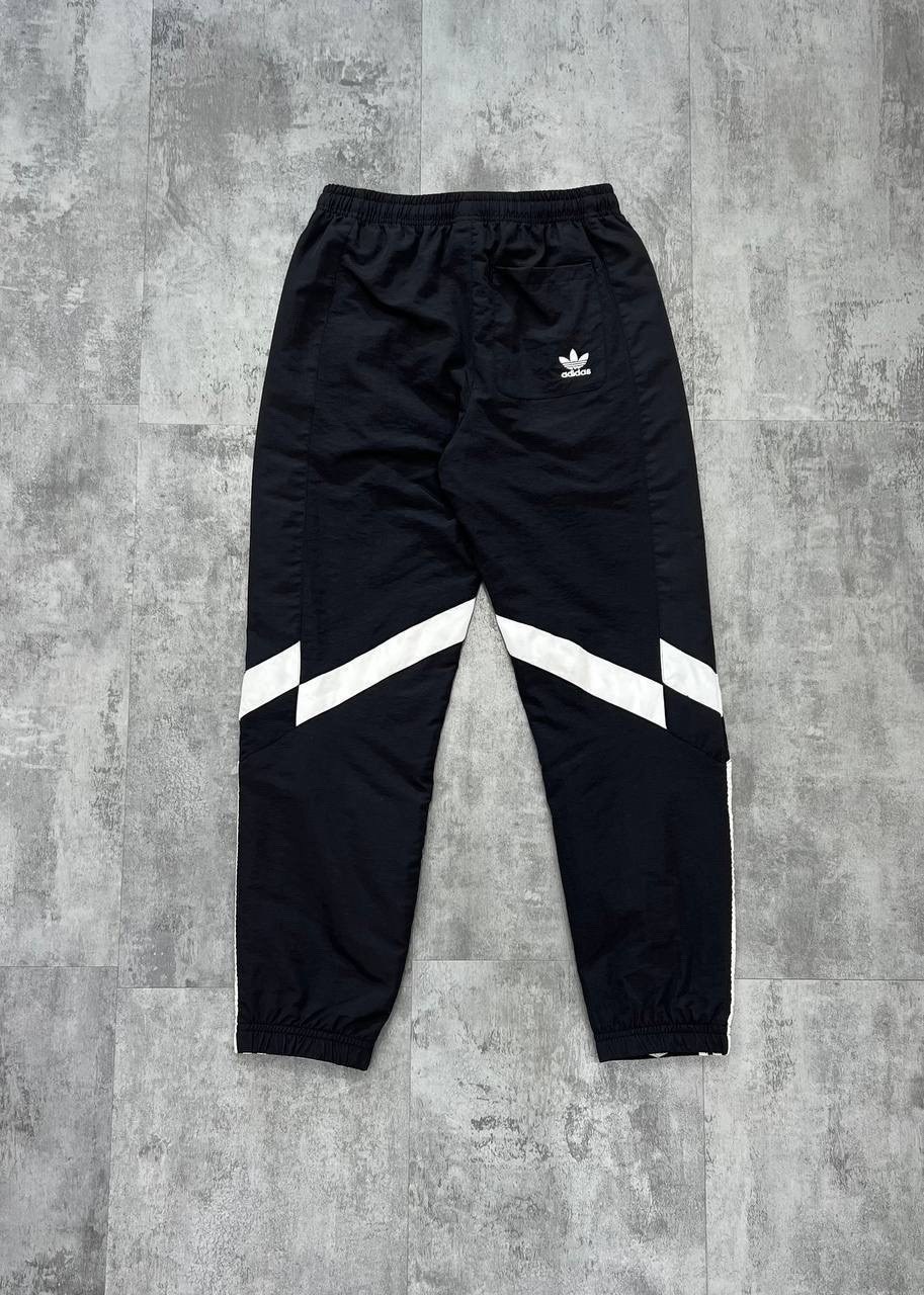 мужские повседневные брюки nike,спортивные брюки nike,мужские брюки nike,спортивные штаны nike,nike штаны swoosh woven