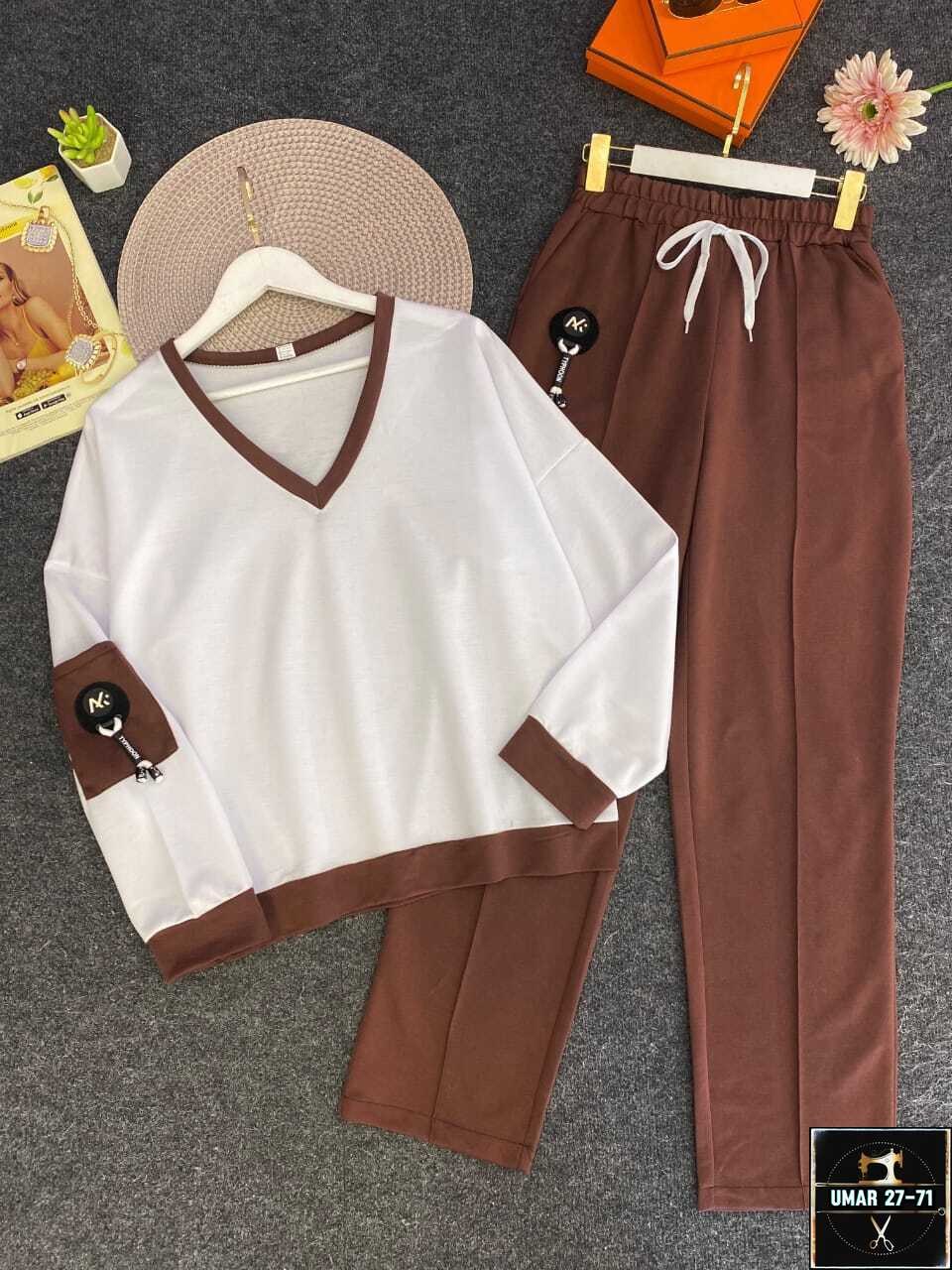 спортивный костюм модный,трикотажные костюмы,спортивный костюм женский,спортивные костюм,спортивная одежда для женщин