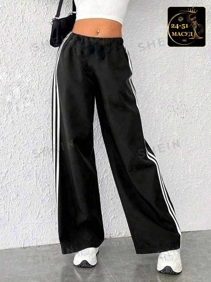 брюки широкие,широкие штаны,штаны с полосками по бокам,повседневные брюки,брюки с широкими штанинами