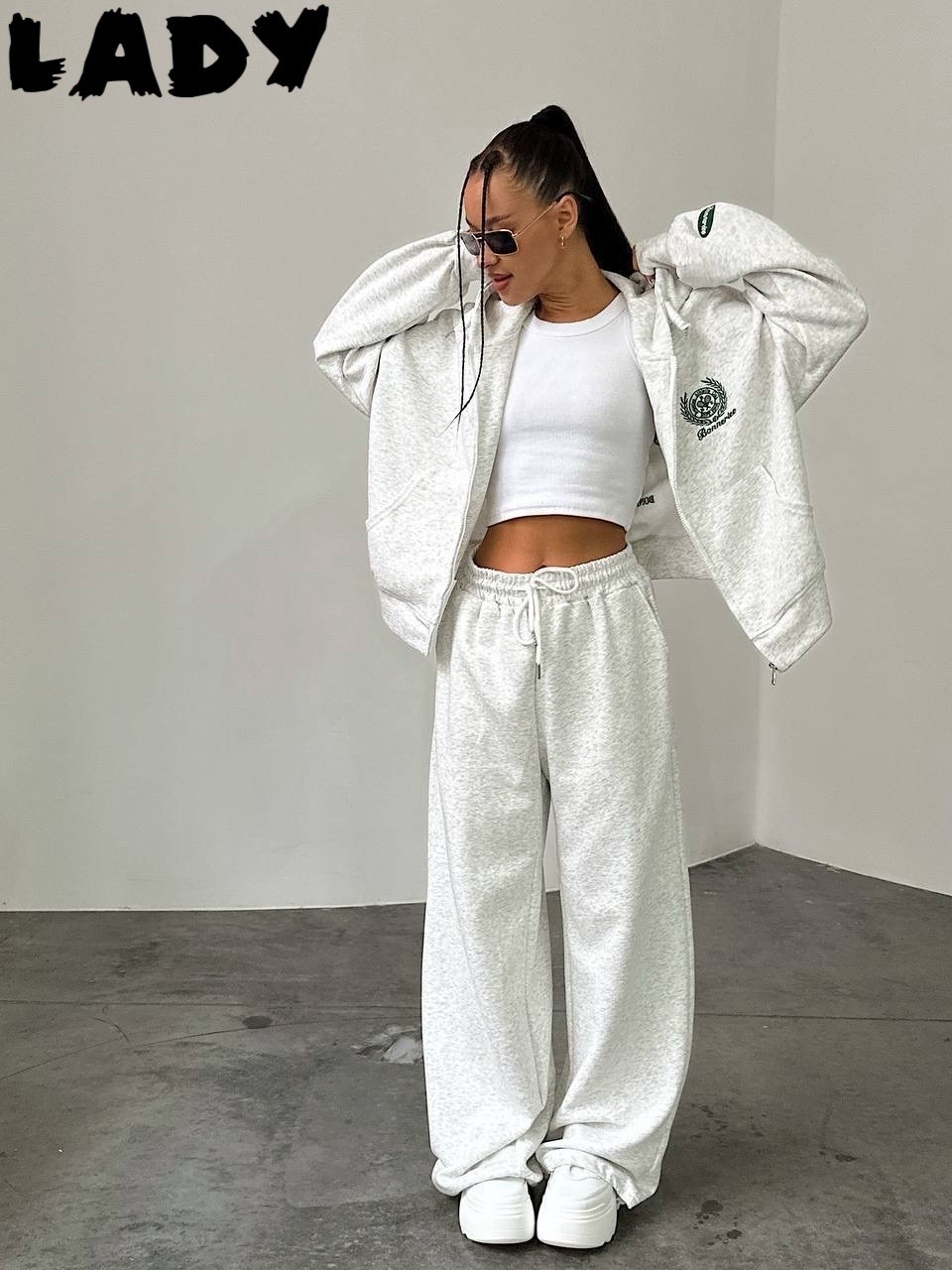 оранжевые спортивные костюмы,трикотажный оранжевый костюм,оранжевый костюм,женские спортивные костюмы,трикотажные костюмы