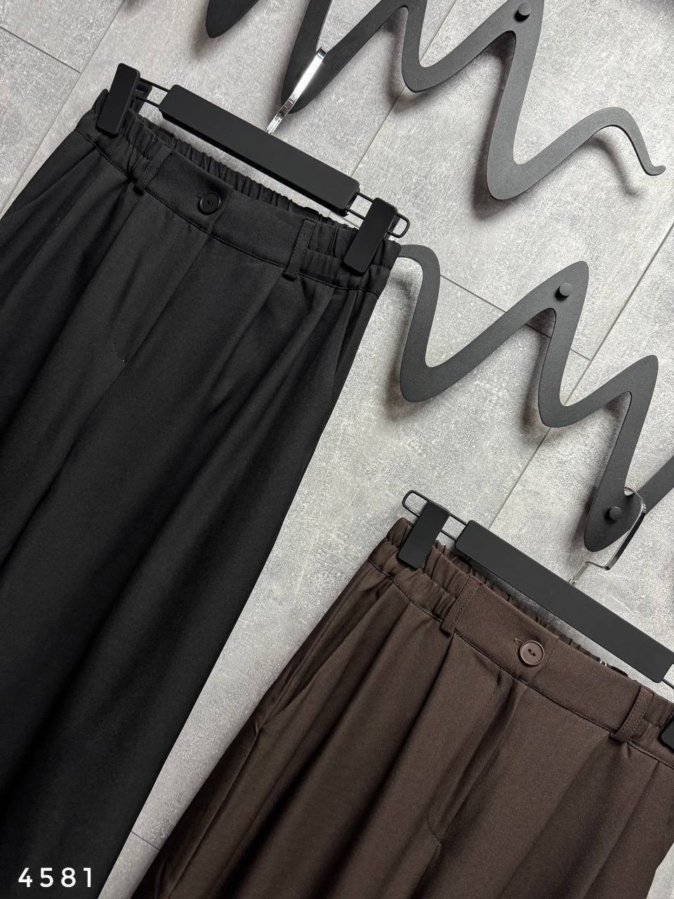 комбинезон брючный палаццо,брюки палаццо,стильные наряды,черные брюки,брюки стиль