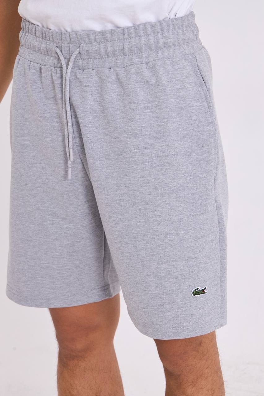 шорты lacoste,шорты лакост мужские,шорты лакоста мужские,спортивные шорты lacoste,мужские шорты lacoste свободной посадки