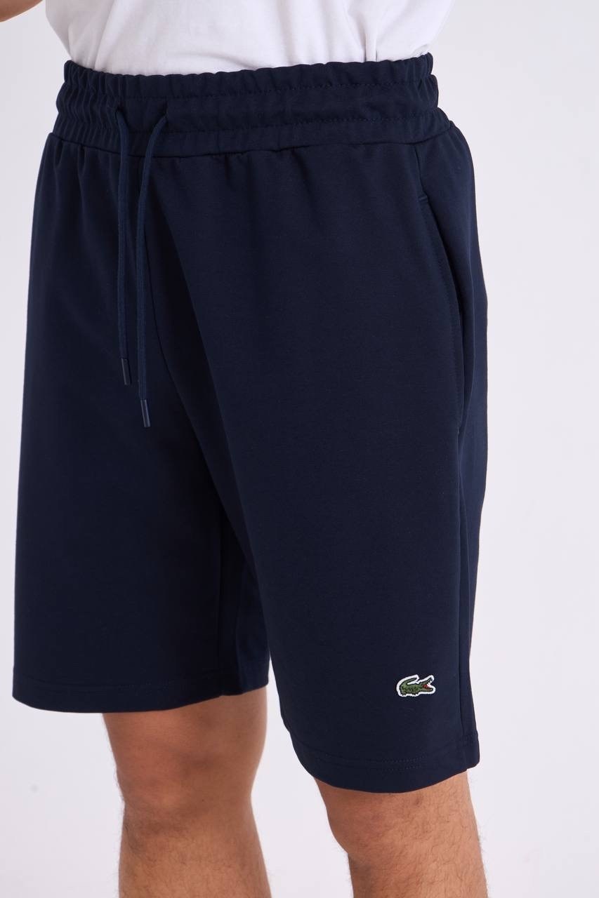 шорты lacoste,шорты лакост мужские,шорты лакоста мужские,спортивные шорты lacoste,мужские шорты lacoste свободной посадки