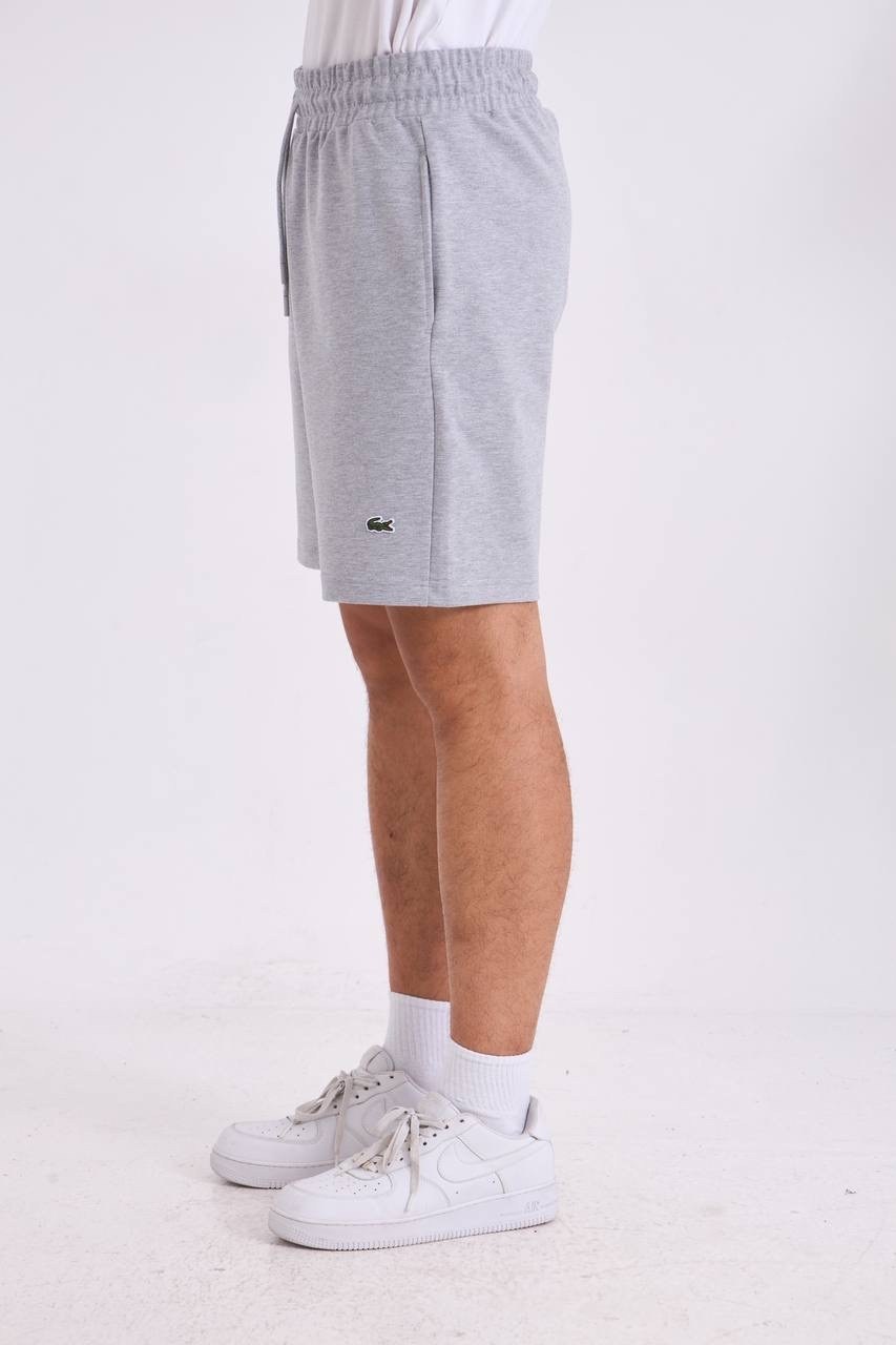 шорты lacoste,шорты лакост мужские,шорты лакоста мужские,спортивные шорты lacoste,мужские шорты lacoste свободной посадки