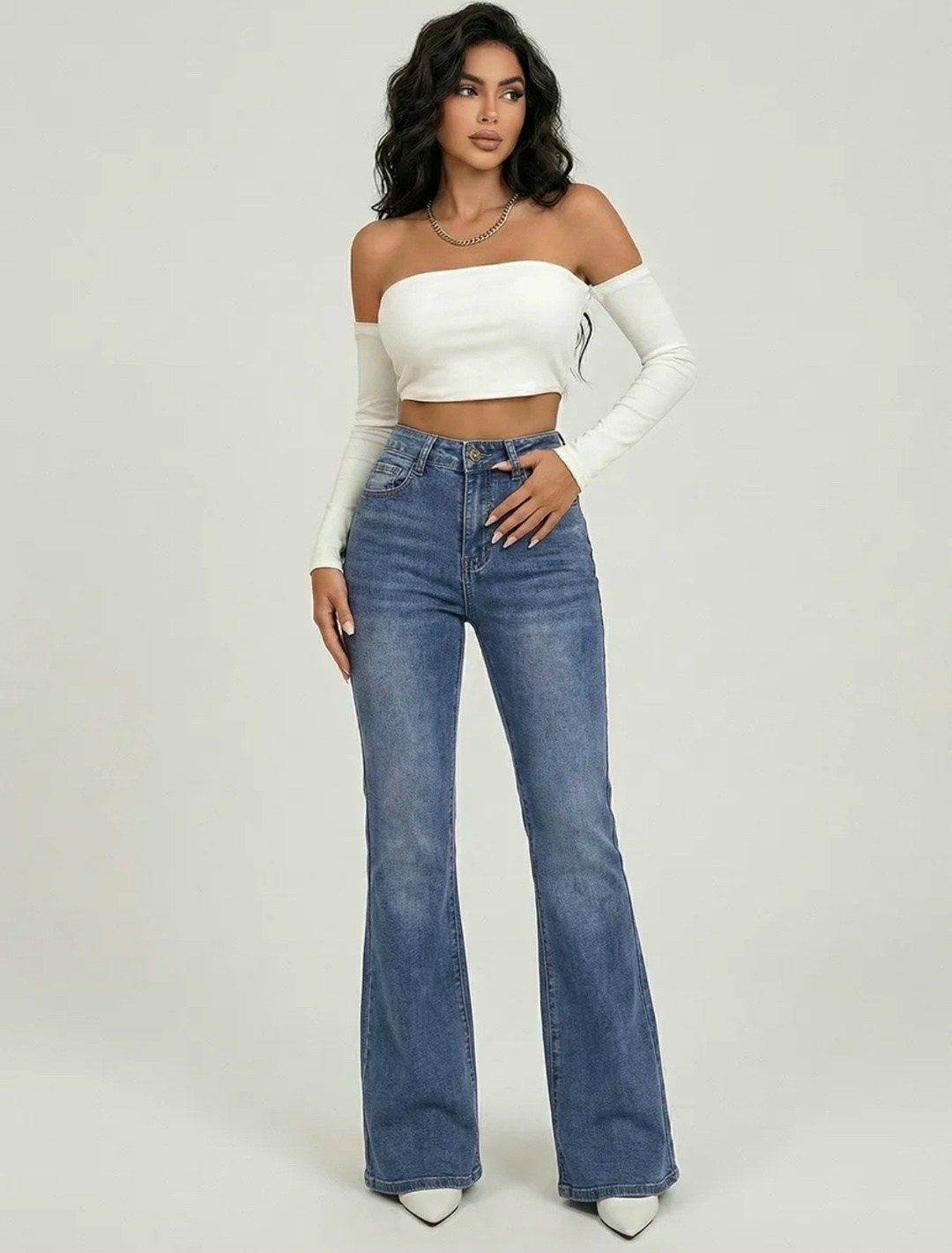 женские джинсы клеш,стильные джинсы,джинсы женские,расклешенные джинсы,голубые джинсы клеш