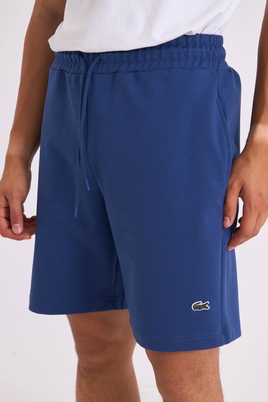 шорты lacoste,шорты лакост мужские,шорты лакоста мужские,спортивные шорты lacoste,мужские шорты lacoste свободной посадки
