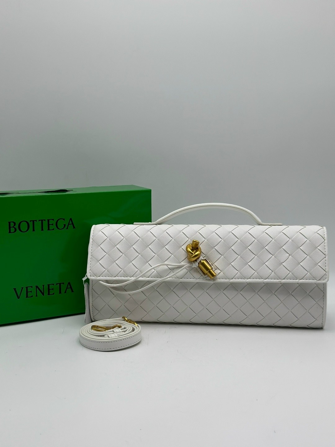 сумка клатч плетеная в стиле боттега bottega veneta,клатч bottega veneta,сумка женская bottega veneta,женский кожаный клатч bottega veneta andiamo черный,сумка bottega veneta