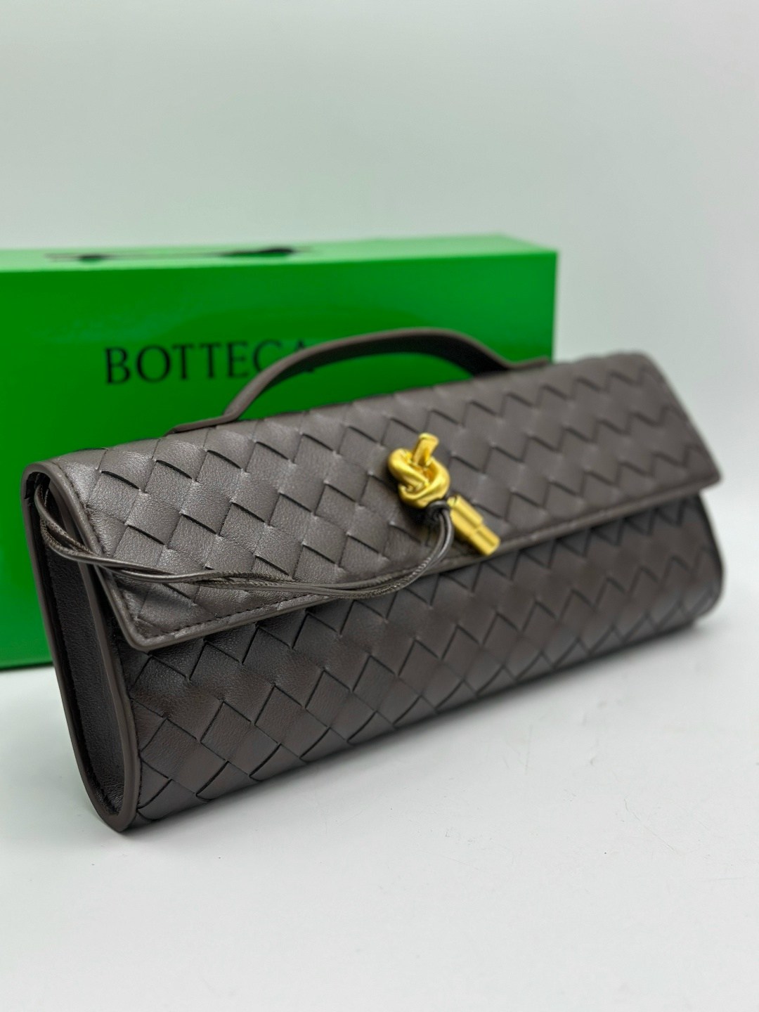 сумка клатч плетеная в стиле боттега bottega veneta,клатч bottega veneta,сумка женская bottega veneta,женский кожаный клатч bottega veneta andiamo черный,сумка bottega veneta