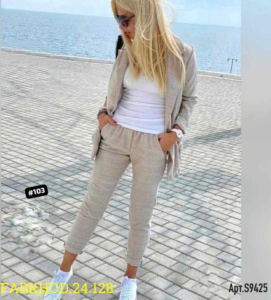 женский костюм двойка,блондинка в белом костюме брючном,женские костюмы,женский костюм тройка,костюм двойка