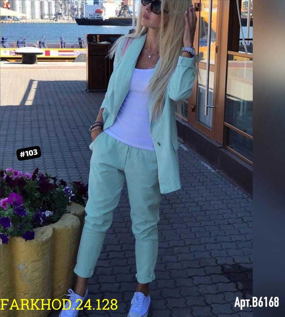 женский костюм двойка,блондинка в белом костюме брючном,женские костюмы,женский костюм тройка,костюм двойка
