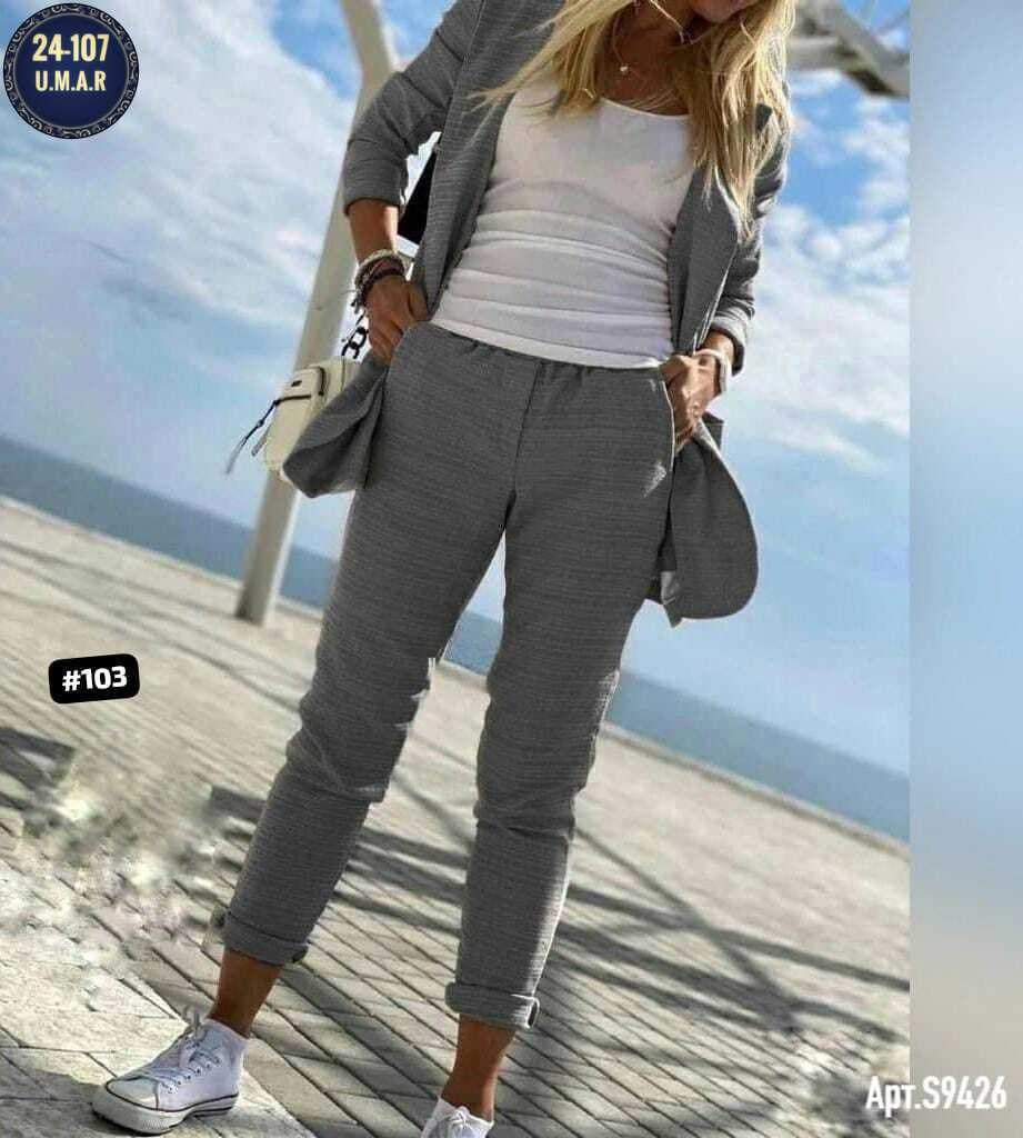 женский костюм двойка,блондинка в белом костюме брючном,женские костюмы,женский костюм тройка,костюм двойка