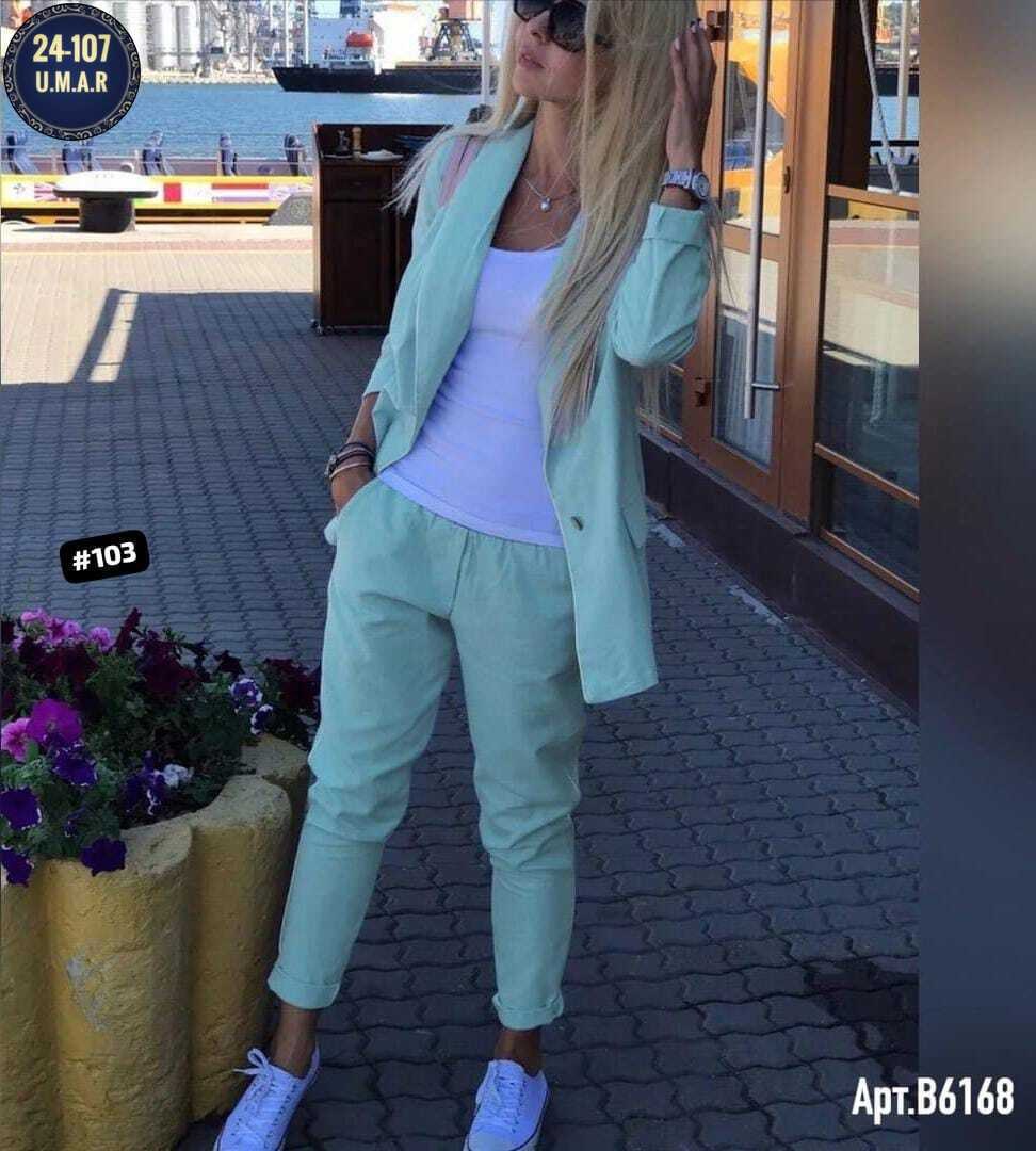 женский костюм двойка,блондинка в белом костюме брючном,женские костюмы,женский костюм тройка,костюм двойка