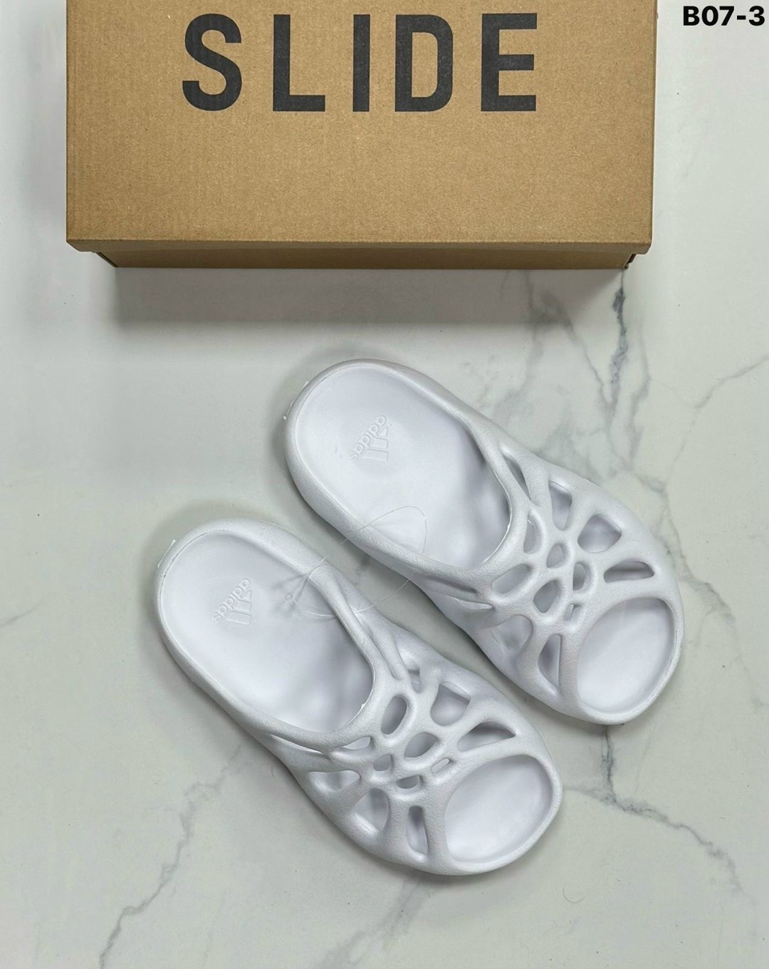 adidas yeezy foam runner,adidas yeezy 450 slide,кроссовки adidas yeezy foam runner,adidas yeezy foam runner white,сланцы yeezy foam runner