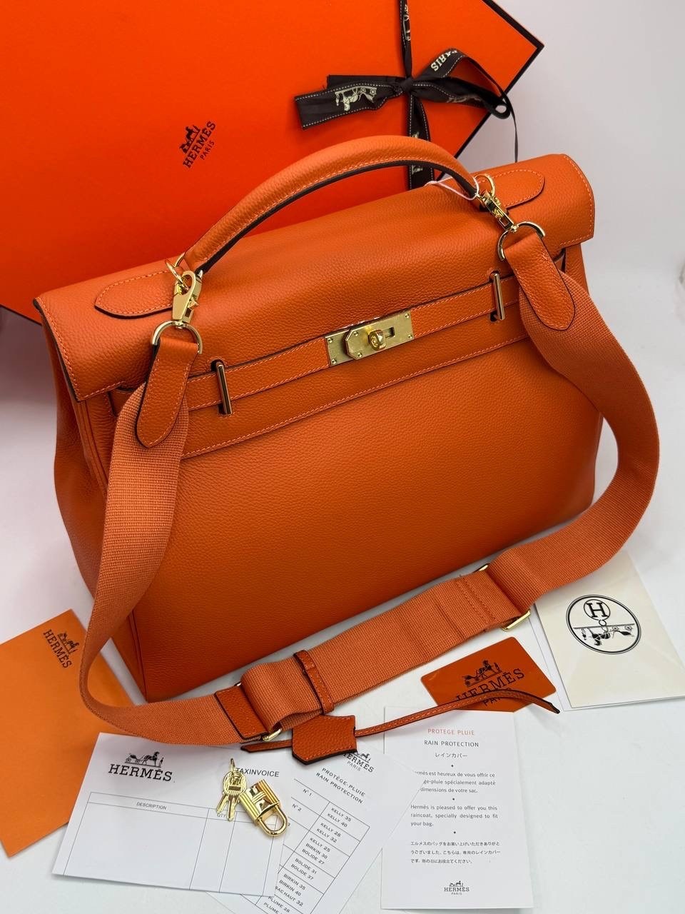 hermes сумка,hermes оранжевая кожаная сумка тоут,женская сумка hermes,сумка hermes kelly оранжевая,сумка hermes kelly