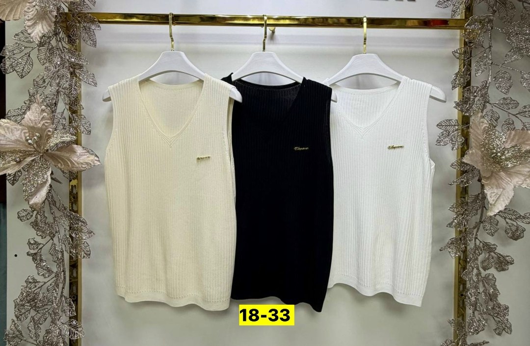 жилетка вязаная,жилетка женская,жилет вязаный,трикотажный жилет,женский вязаный жилет