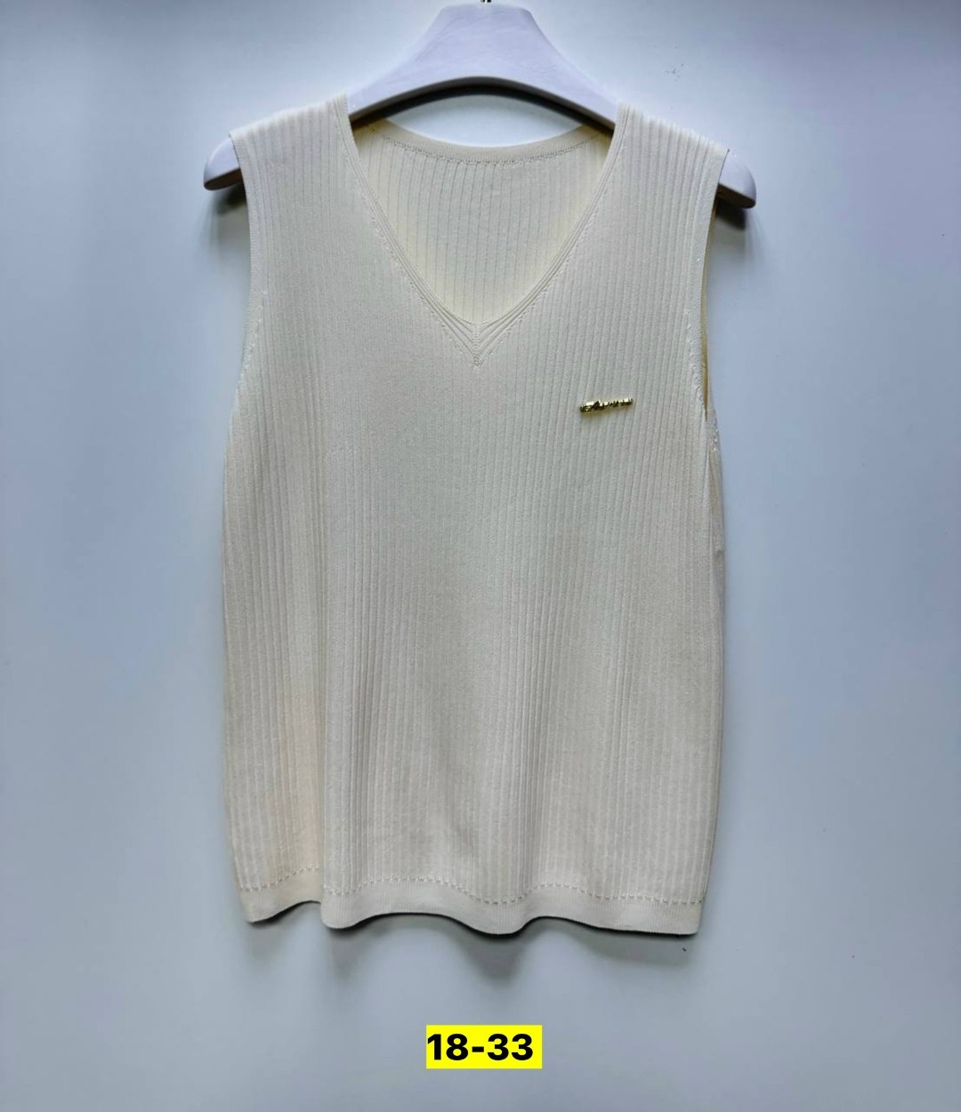 жилетка вязаная,жилетка женская,жилет вязаный,трикотажный жилет,женский вязаный жилет