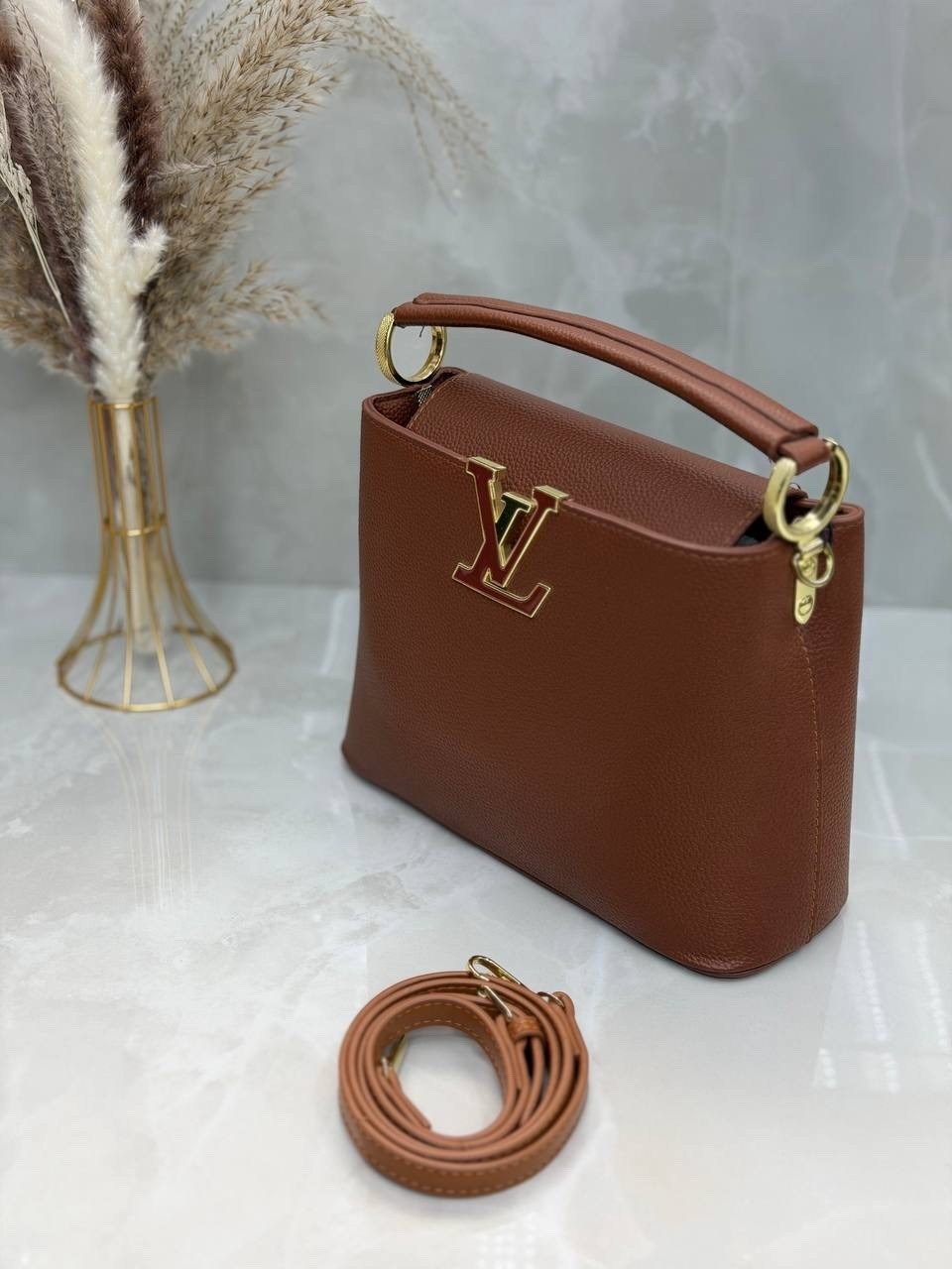 кожаная сумка louis vuitton capucines pm черная,сумка louis vuitton,louis vuitton женская сумка,louis vuitton capucines,сумка louis vuitton capucines