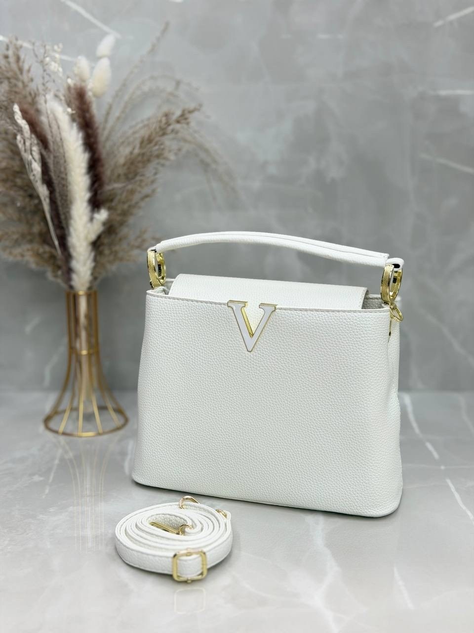 кожаная сумка louis vuitton capucines pm черная,сумка louis vuitton,louis vuitton женская сумка,louis vuitton capucines,сумка louis vuitton capucines