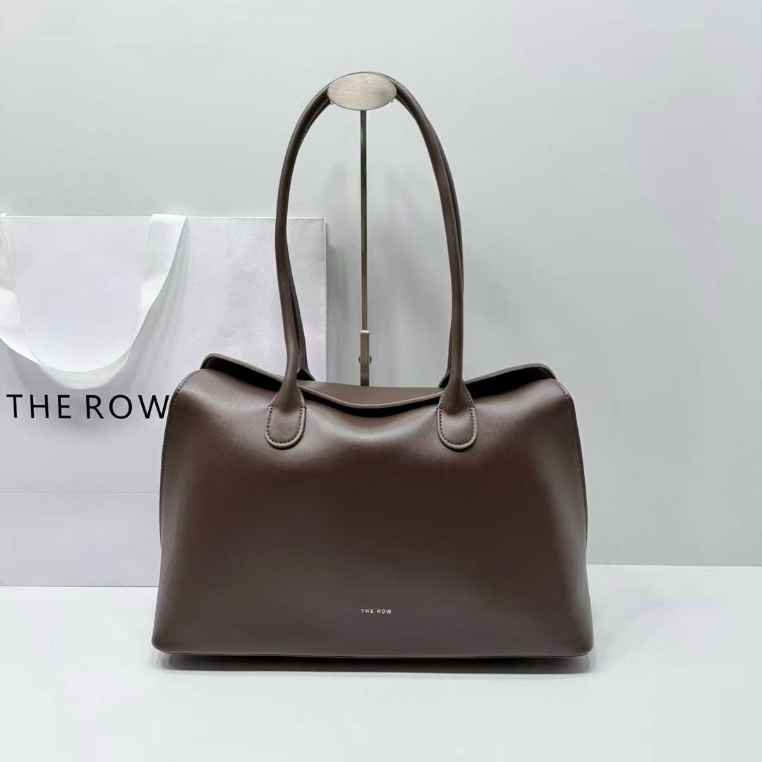 темно-коричневая кожаная сумка the row soft margaux 15,сумка the row,сумка-the-row-margaux-12-темно-коричневая,женская кожаная сумка the row margaux 17 темно-коричневая,темно-коричневая кожаная сумка