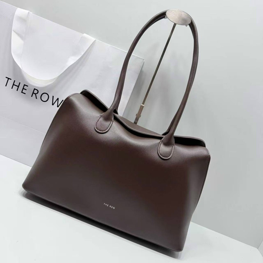 темно-коричневая кожаная сумка the row soft margaux 15,сумка the row,сумка-the-row-margaux-12-темно-коричневая,женская кожаная сумка the row margaux 17 темно-коричневая,темно-коричневая кожаная сумка