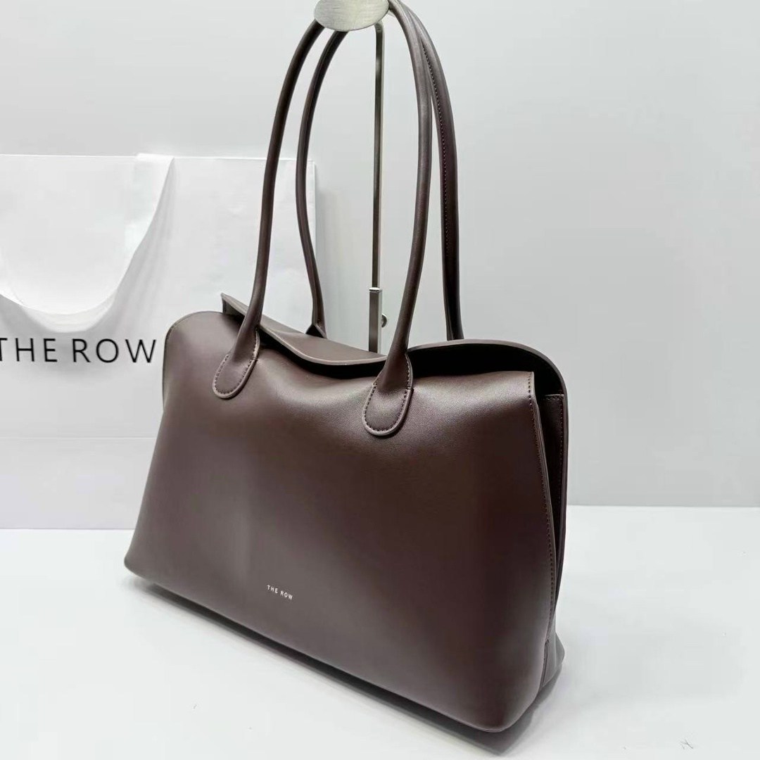 темно-коричневая кожаная сумка the row soft margaux 15,сумка the row,сумка-the-row-margaux-12-темно-коричневая,женская кожаная сумка the row margaux 17 темно-коричневая,темно-коричневая кожаная сумка
