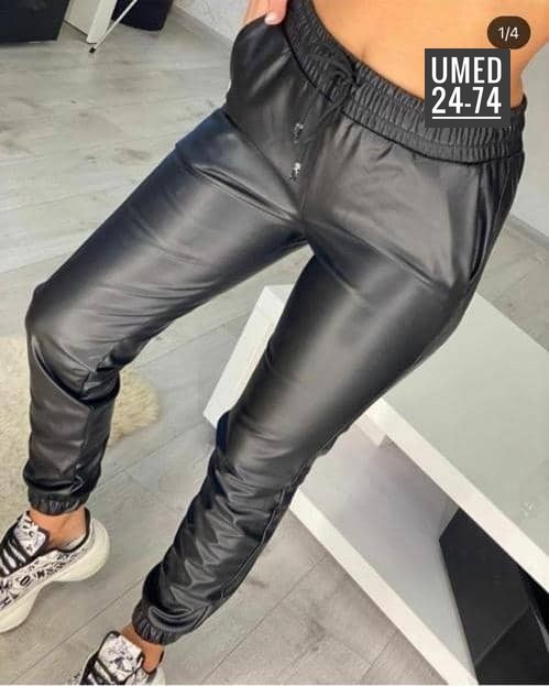 брюки джоггеры кожаные,джоггеры женские кожаные,кожаные брюки свободные,брюки из экокожи женские,джогеры женские