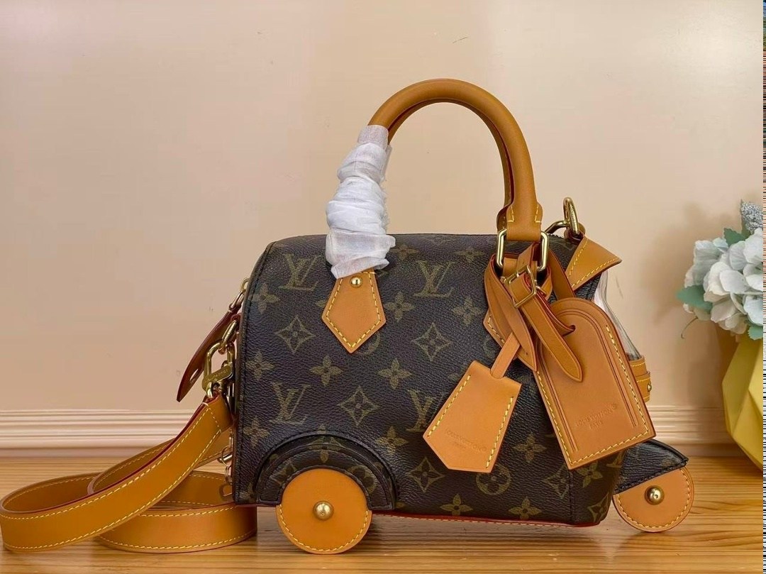 сумка louis vuitton,женская сумка louis vuitton,louis vuitton сумка на плечо,ручная сумка коричневого цвета louis vuitton,louis vuitton speedy