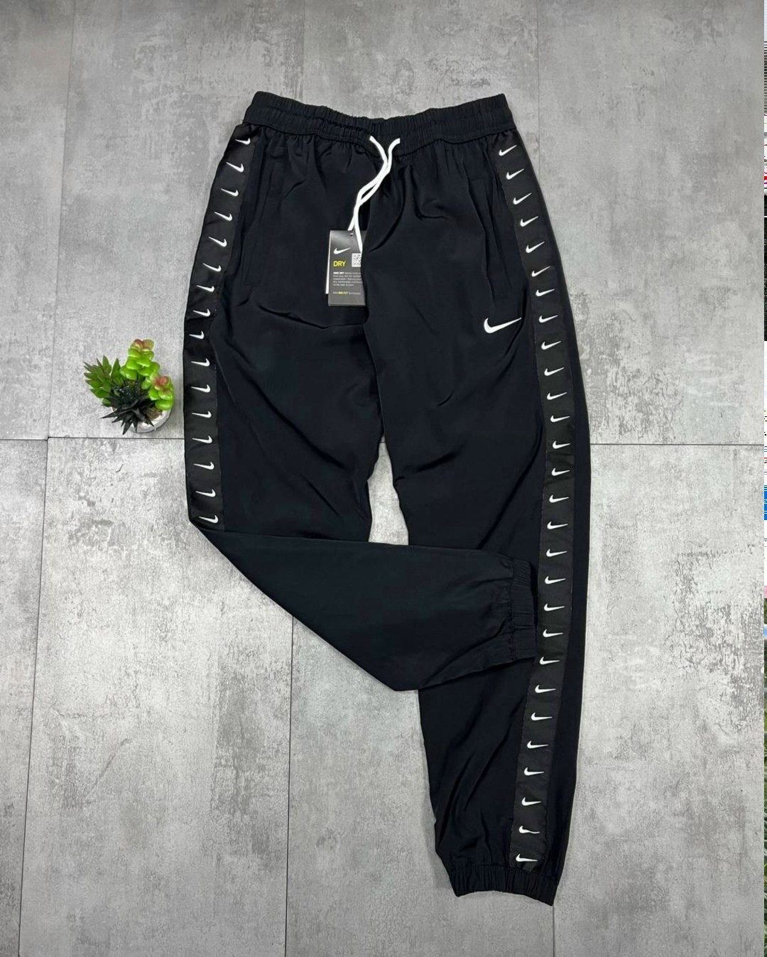 nike swoosh,nike sportswear swoosh,спортивные штаны nike,спортивные костюмы nike,nike nike
