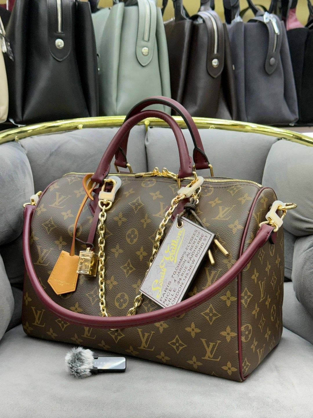 классическая сумка speedy louis vuitton с монограммой,сумка женская louis vuitton,сумка louis vuitton,сумка луи виттон женская,louis vuitton модная сумка с замком