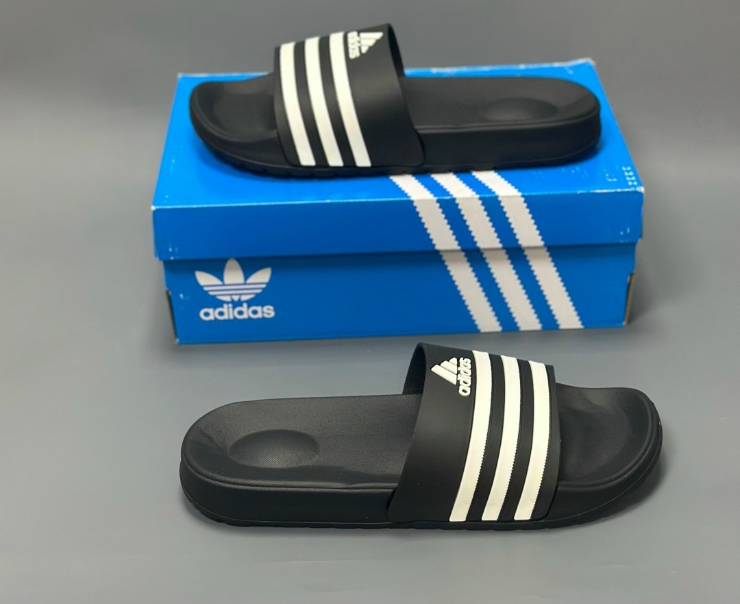 шлепанцы adidas,adidas adilette comfort slides,adidas шлепки 2026,adidas slides,adidas adilette comfort