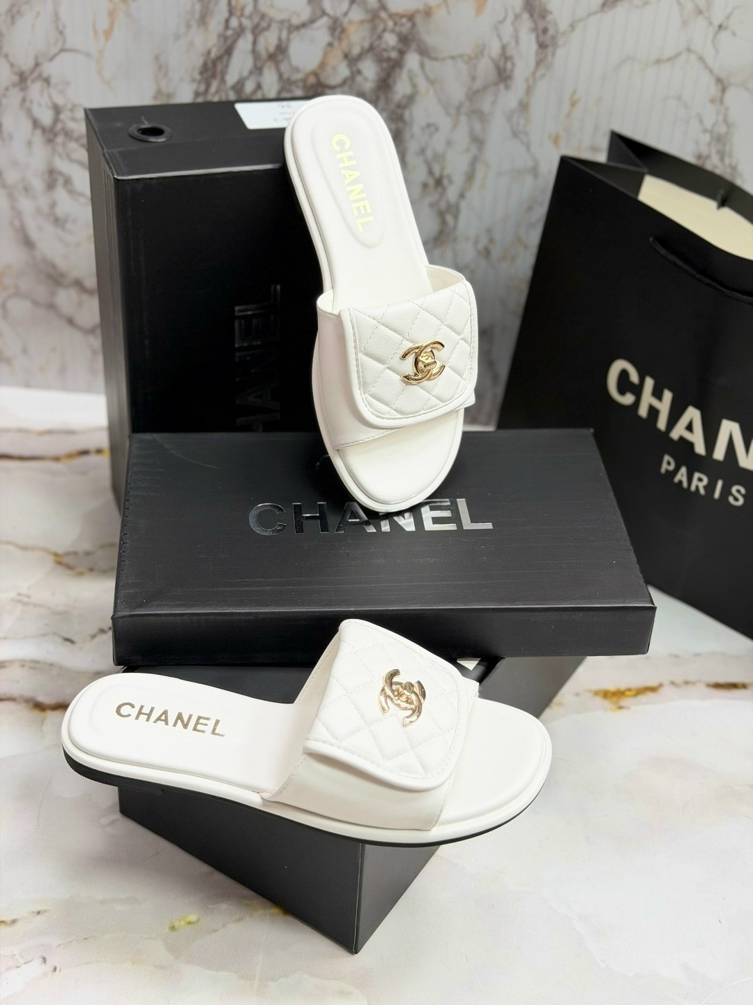шлепанцы chanel,шлепки шанель,тапочки женские chanel,тапочки chanel,черные кожаные шлепки chanel