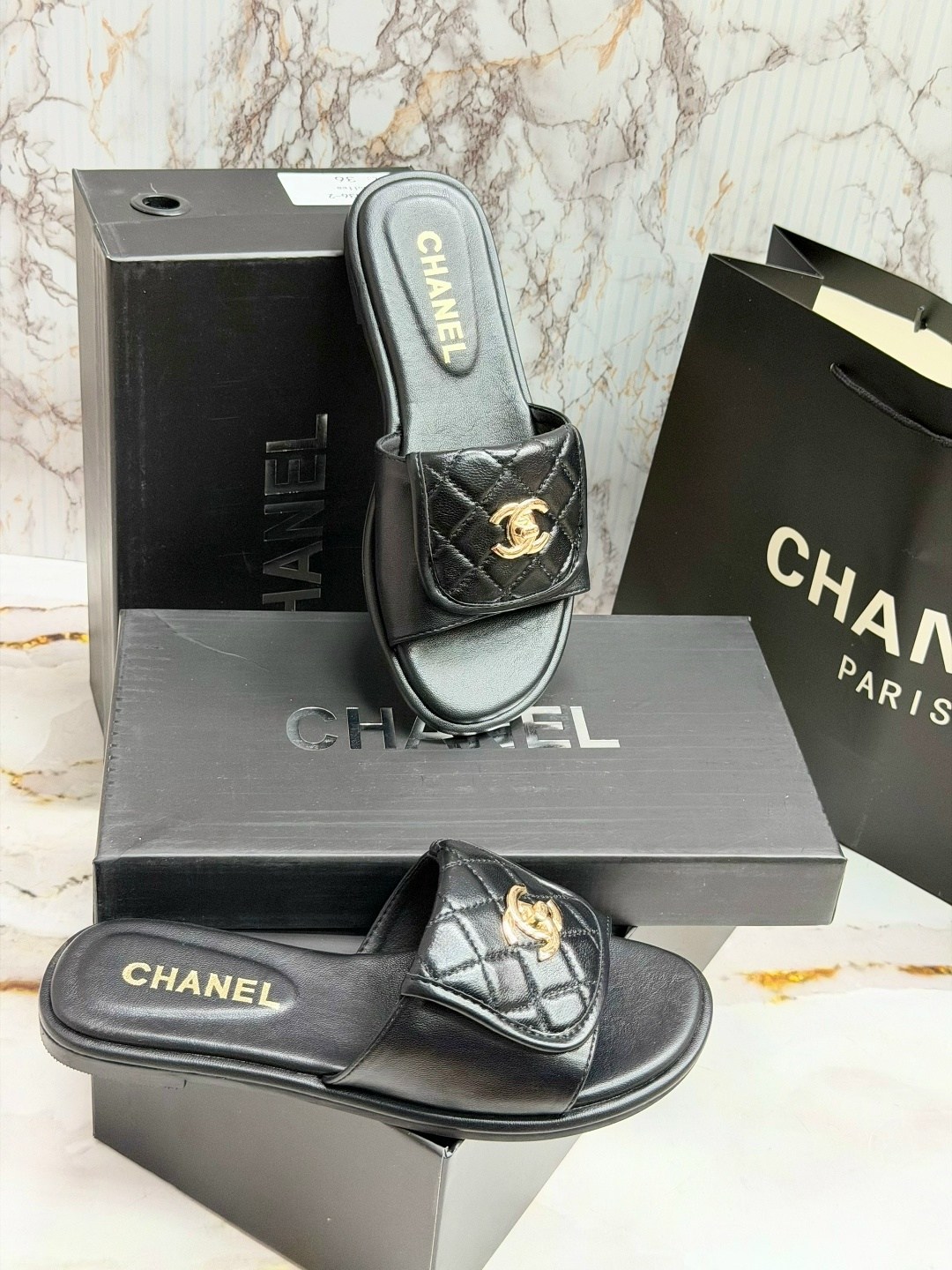 шлепанцы chanel,шлепки шанель,тапочки женские chanel,тапочки chanel,черные кожаные шлепки chanel