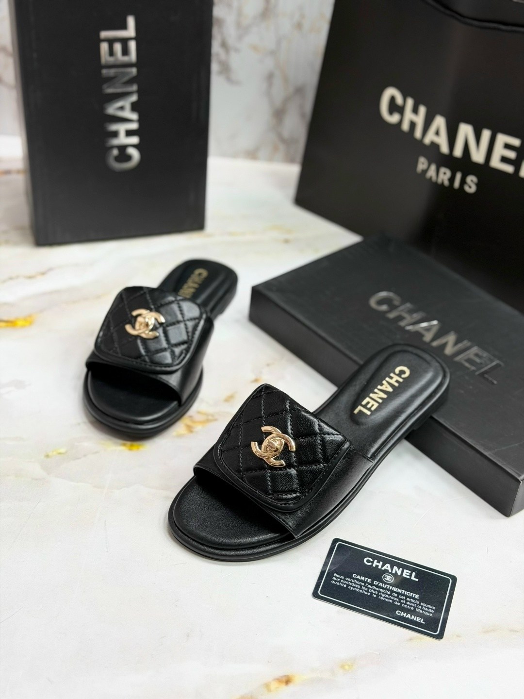 шлепанцы chanel,шлепки шанель,тапочки женские chanel,тапочки chanel,черные кожаные шлепки chanel