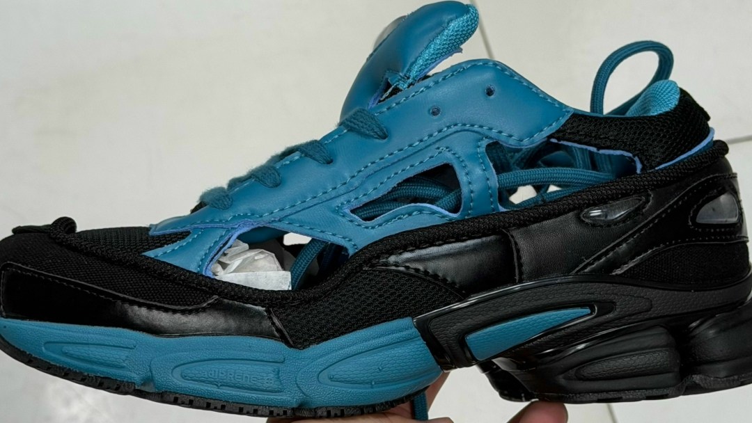 raf simons x adidas replicant ozweego,adidas rs replicant ozweego raf simons colonial blue,adidas x raf simons rs replicant ozweego limited edition teal black,adidas ozweego replicant x raf simons bla