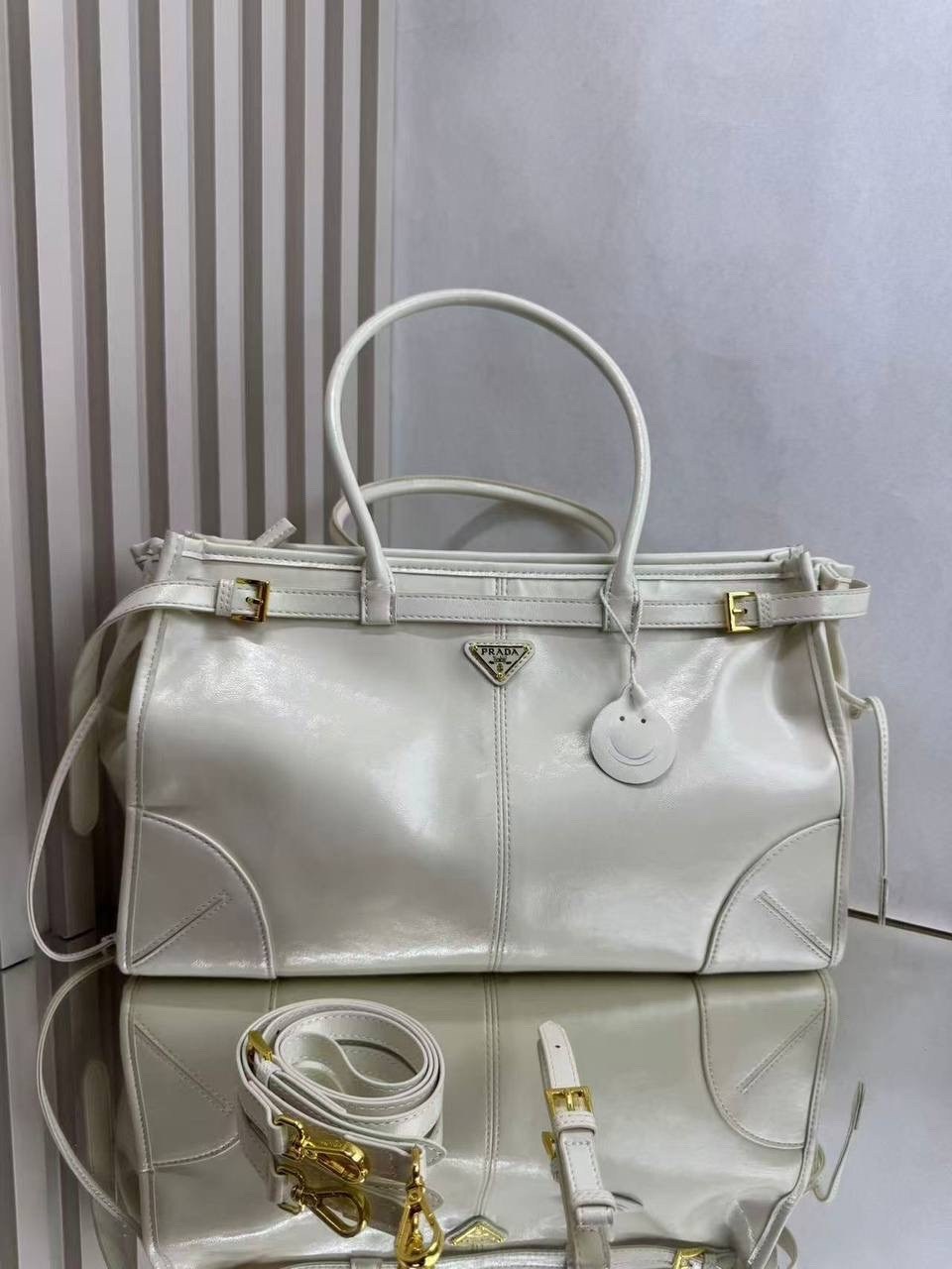 сумка женская prada,сумки,сумка prada бордовая,prada кожаная сумка среднего размера,сумка prada натуральная кожа 38х24