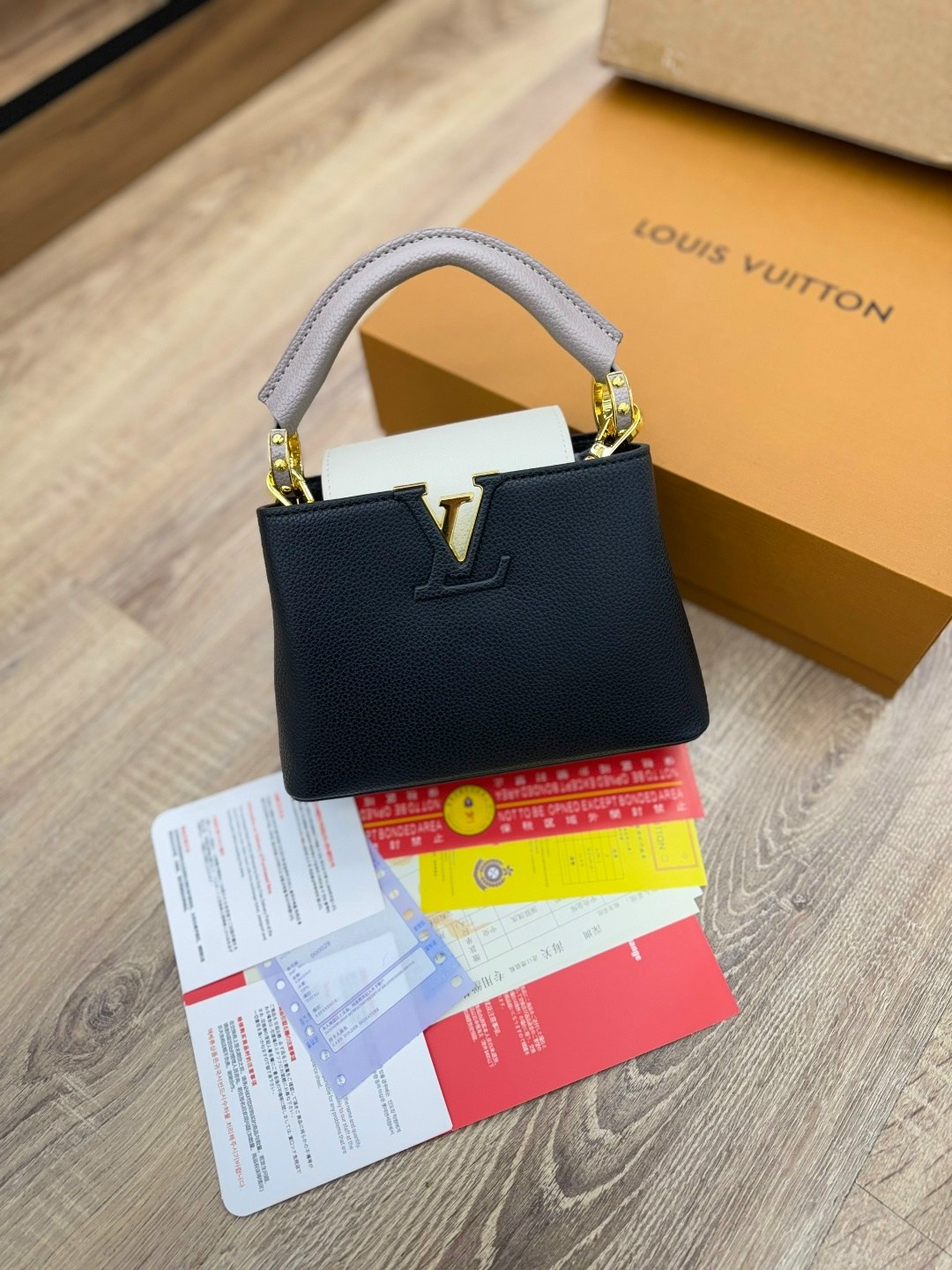 louis vuitton женская сумка,louis vuitton capucines,сумка louis vuitton,кожаная черная сумка louis vuitton capucines pm,луи виттон сумка
