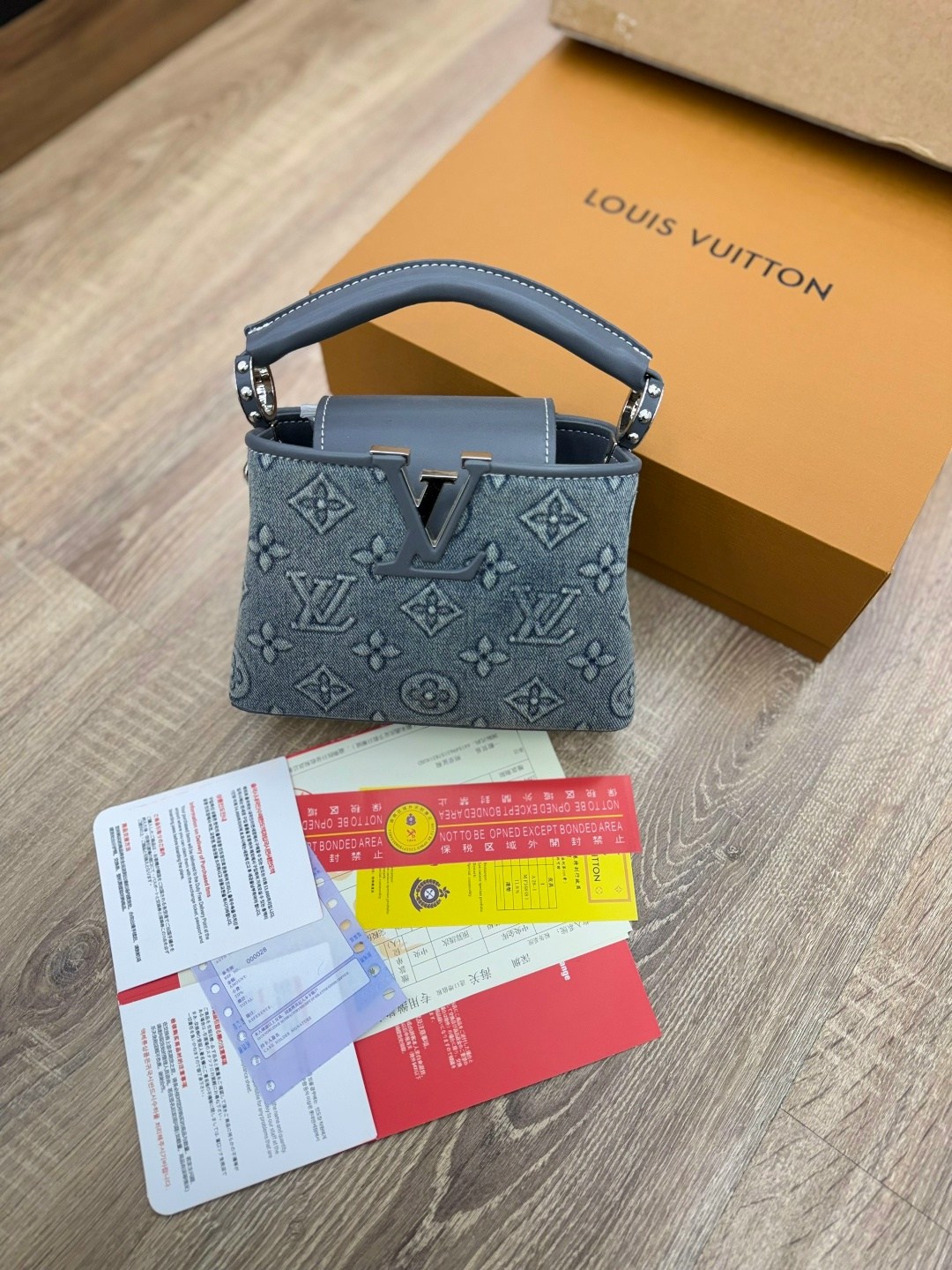 louis vuitton женская сумка,louis vuitton capucines,сумка louis vuitton,кожаная черная сумка louis vuitton capucines pm,луи виттон сумка
