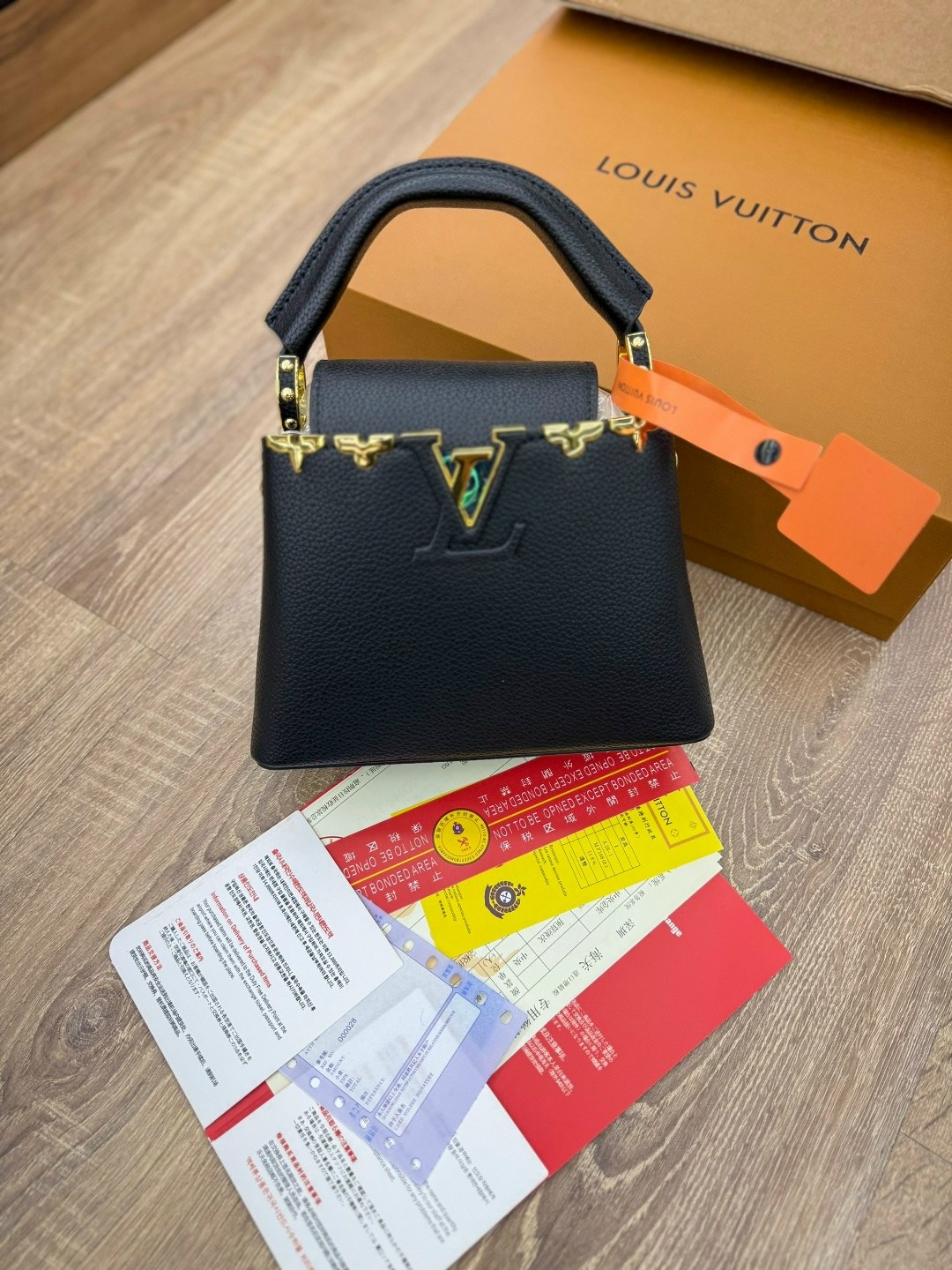 louis vuitton женская сумка,louis vuitton capucines,сумка louis vuitton,кожаная черная сумка louis vuitton capucines pm,луи виттон сумка